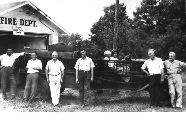 Black and white photo of original members of Peninsula Fire Department